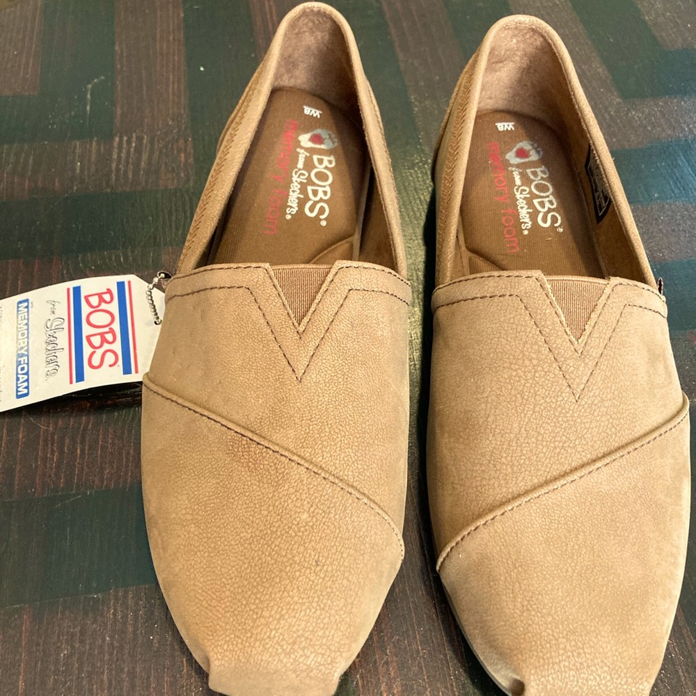 Bob’s brown leather slip-ons.